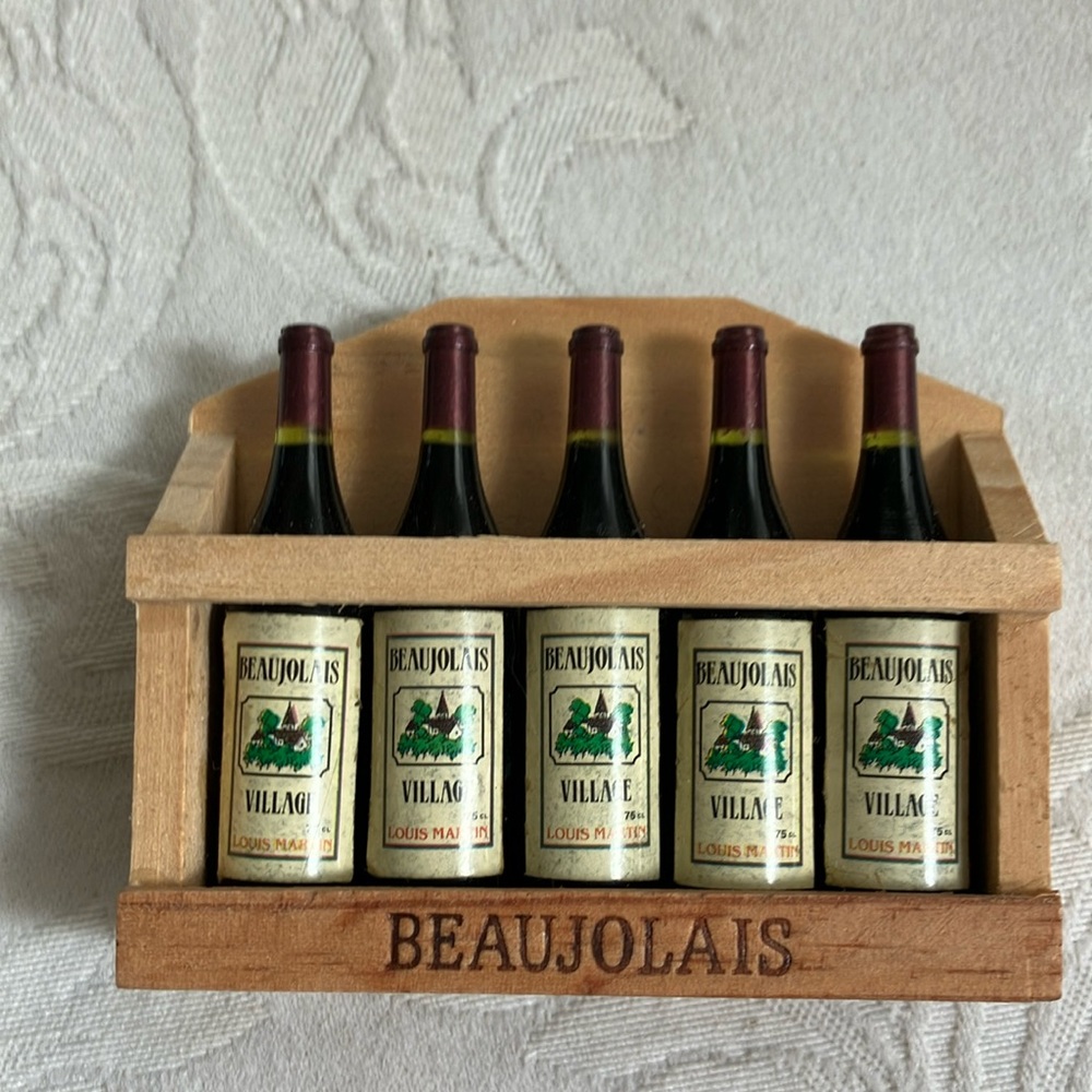 Hand painted French Refrigerator magnet with 5 miniature bottles of Beaujolais.